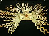 Ecuador Quito 02-07 Museo del Banco Central Radiating Golden Sun-mask The second room in the Museo del Banco Central is the Sala de Oro (Gold Room), which displays the radiating golden sun-mask that is the symbol of the Banco Central, from La Tolita 350 BC � 350 AD.